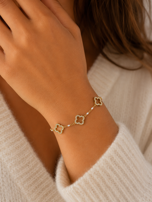 Bracelet ajustable trèfle en acier inoxydable doré serti de strass